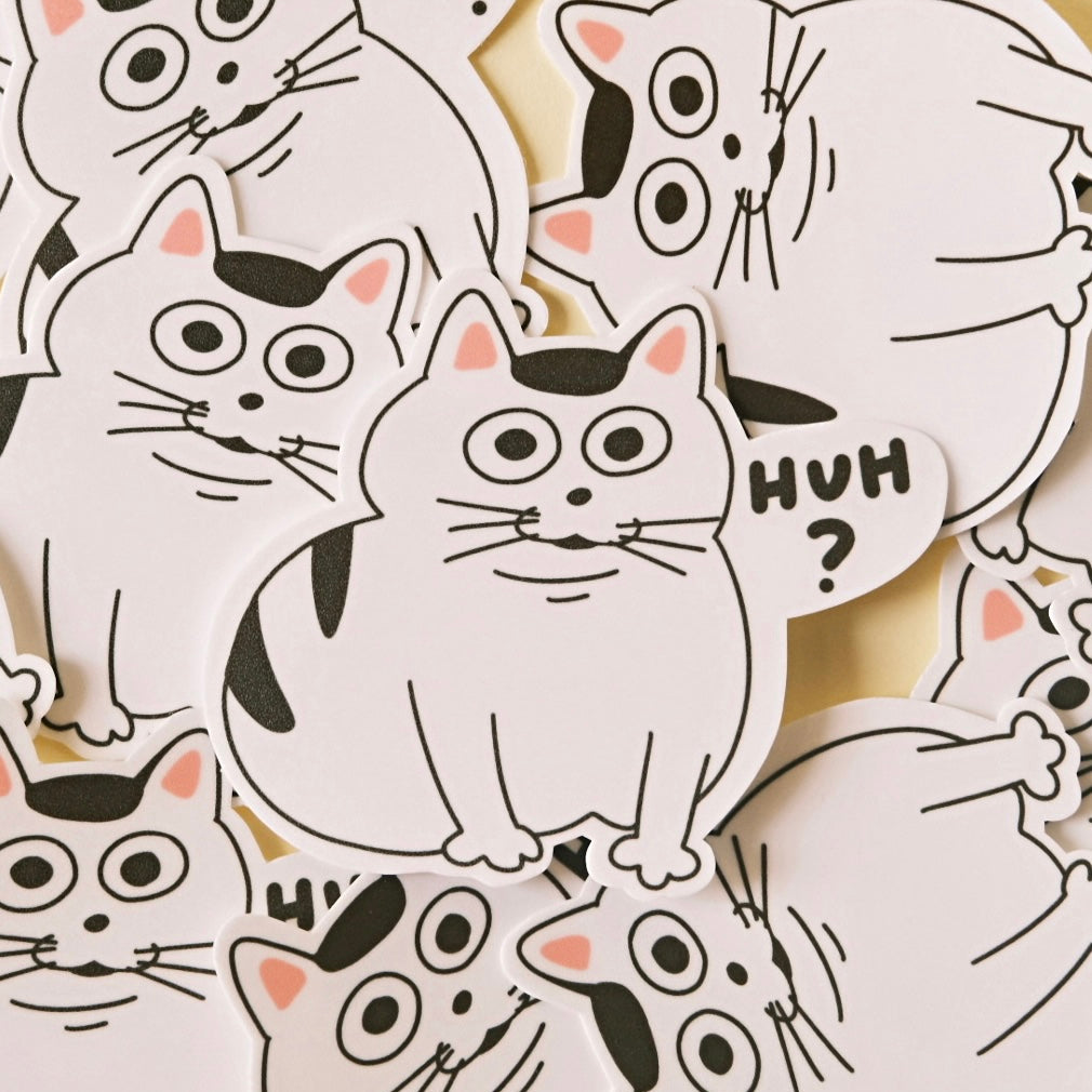 white cat with huh expression sticker